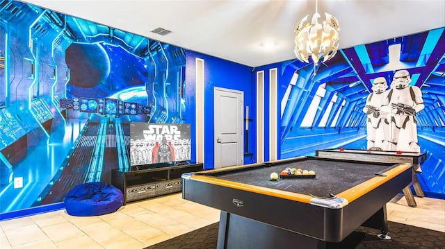 game room featuring light tile patterned flooring, a notable chandelier, and billiards