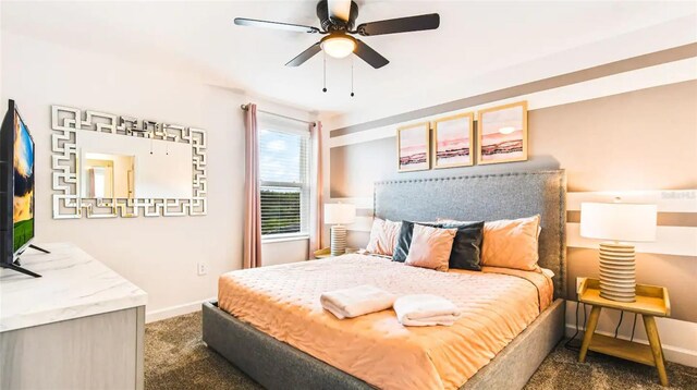 carpeted bedroom with ceiling fan