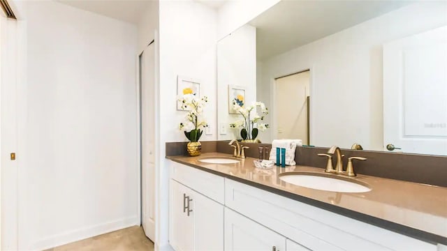 bathroom with vanity and tile patterned floors