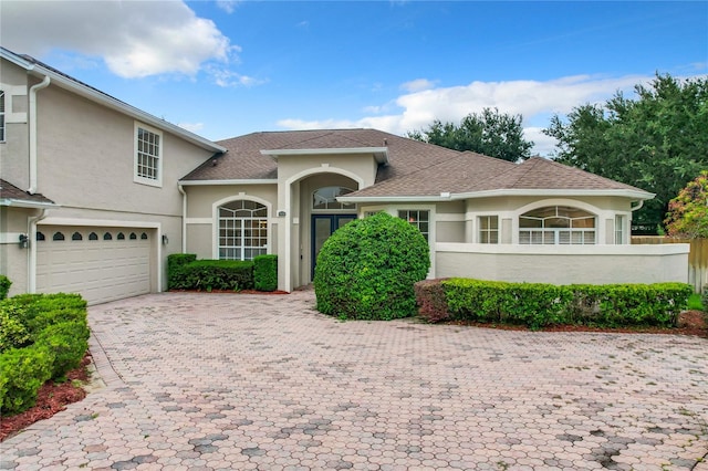 view of front of property featuring a garage