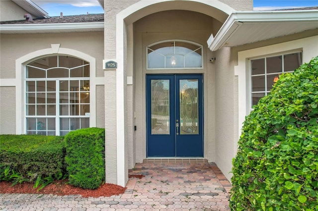 doorway to property featuring french doors