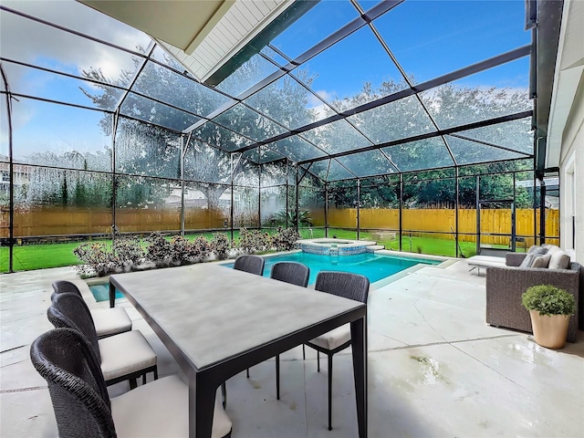 view of swimming pool featuring a lanai, a patio area, and an in ground hot tub