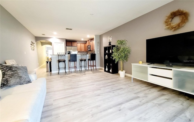 living room with light wood-type flooring