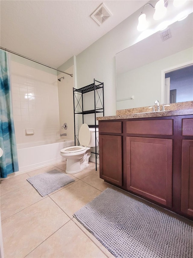 full bathroom with tile patterned floors, shower / bath combination with curtain, toilet, and vanity