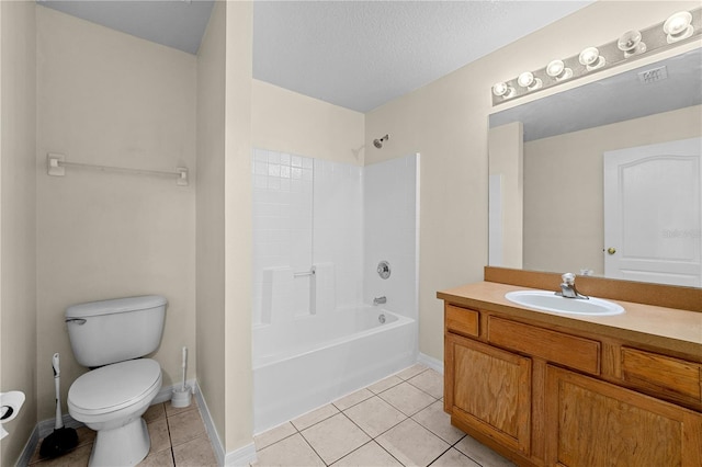 full bathroom featuring tile patterned floors, bathtub / shower combination, vanity, and toilet