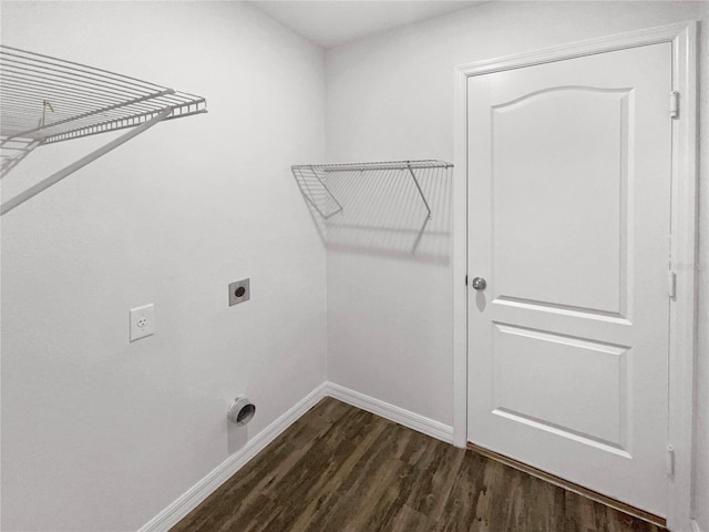 laundry area with dark hardwood / wood-style flooring and electric dryer hookup