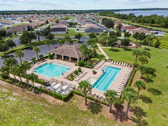 drone / aerial view featuring a water view