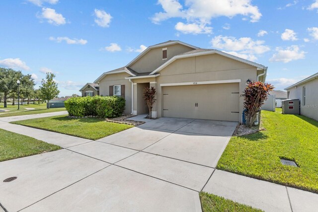 ranch-style house with stucco siding, an attached garage, a front lawn, and concrete driveway