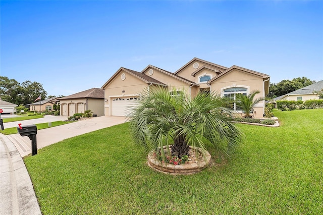 view of front facade with a garage and a front lawn