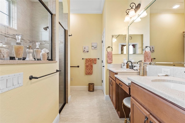 bathroom featuring a shower with door, vanity, ornamental molding, and tile patterned floors