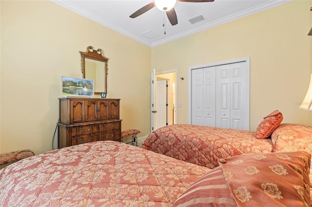 bedroom featuring a closet, ceiling fan, and ornamental molding