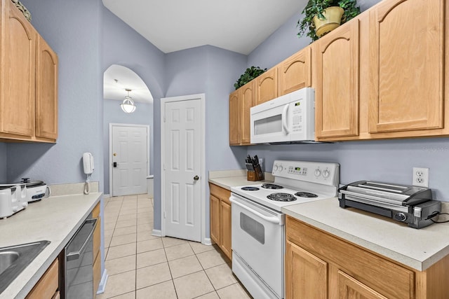 kitchen featuring light brown cabinets, sink, white appliances, and light tile patterned floors