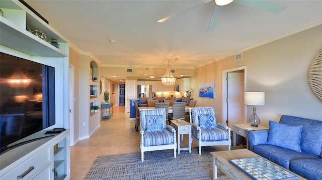5300 S Atlantic Ave Unit 16-602, New Smyrna Beach, FL 32169 - living area featuring light tile patterned flooring, crown molding, ceiling fan, baseboards, and a chandelier