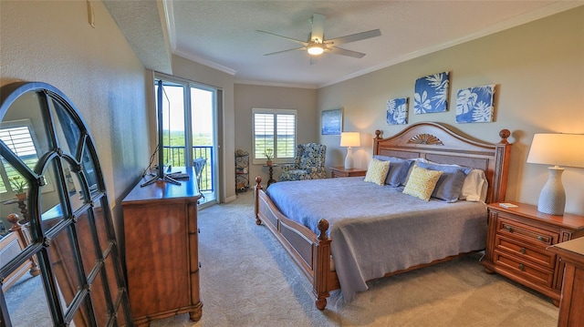 carpeted bedroom with a textured ceiling, ceiling fan, ornamental molding, and access to outside