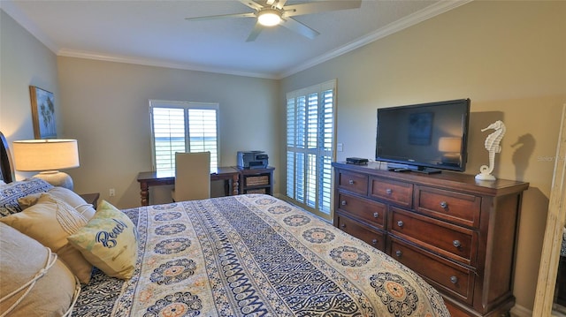 bedroom featuring ceiling fan and crown molding