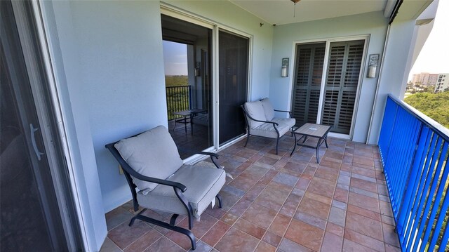 5300 S Atlantic Ave Unit 16-602, New Smyrna Beach, FL 32169 - balcony featuring a ceiling fan