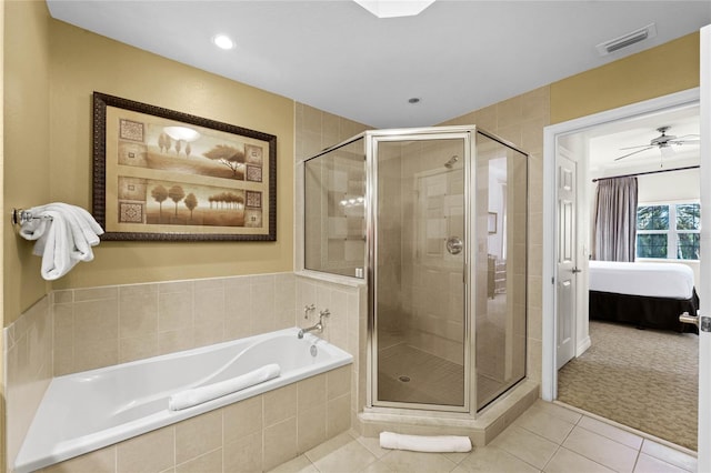 bathroom featuring independent shower and bath, ceiling fan, and tile patterned floors