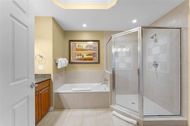 bathroom with ornamental molding, vanity, shower with separate bathtub, and tile patterned flooring