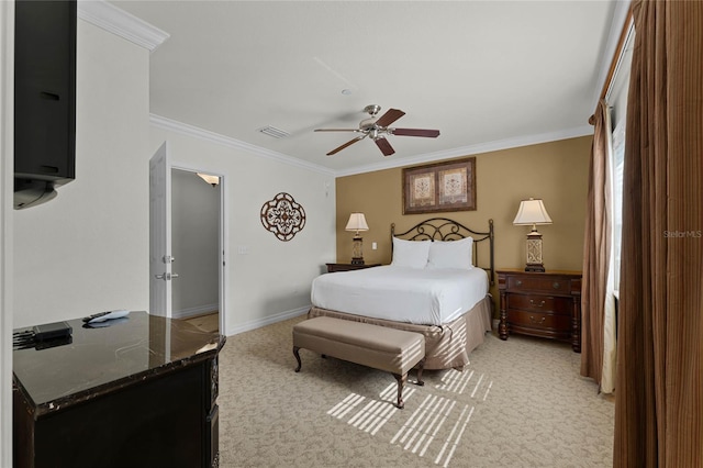 bedroom with crown molding, ceiling fan, and light carpet