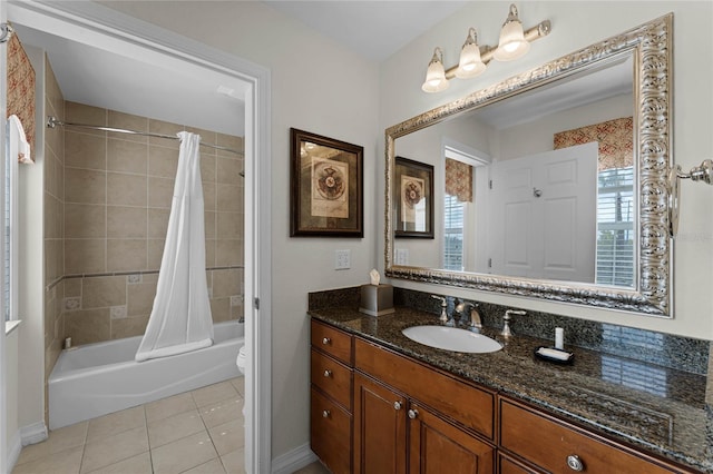 full bathroom featuring tile patterned floors, shower / bath combo, toilet, and vanity