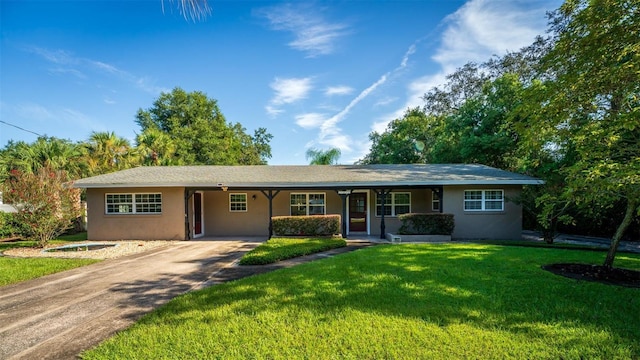 ranch-style home featuring a front yard