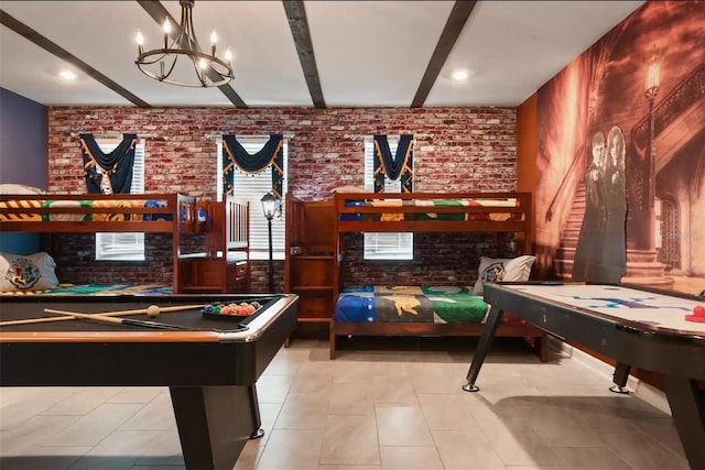 playroom with billiards, brick wall, light tile patterned flooring, and beamed ceiling