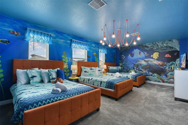 carpeted bedroom featuring a textured ceiling and a notable chandelier