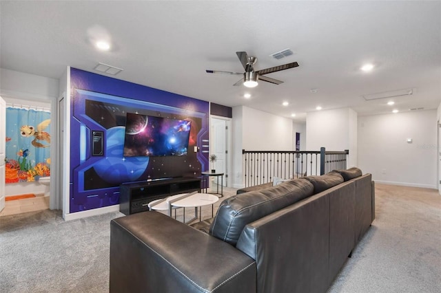 carpeted living room featuring ceiling fan