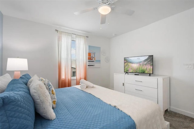 bedroom with ceiling fan and carpet