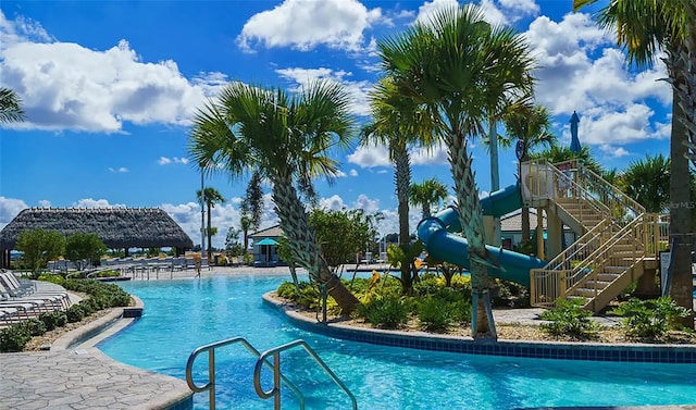 view of pool featuring a water slide