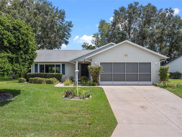 ranch-style house with a front yard and a garage