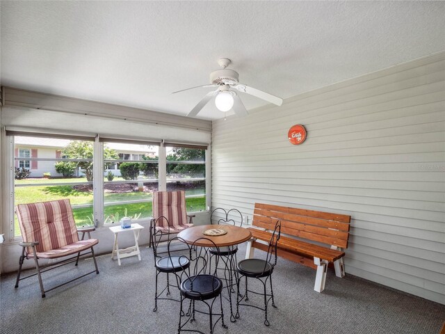 sunroom / solarium with ceiling fan