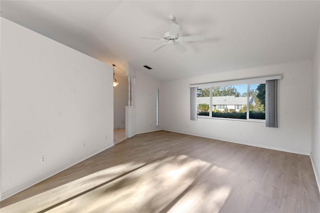 spare room featuring ceiling fan and light wood-type flooring