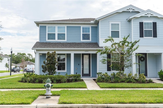 view of front of home with a front lawn