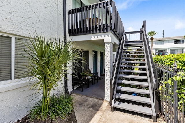 doorway to property featuring a patio