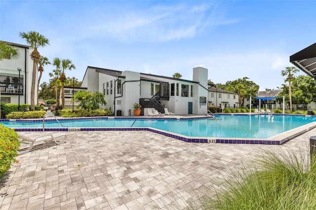 view of pool with a patio area