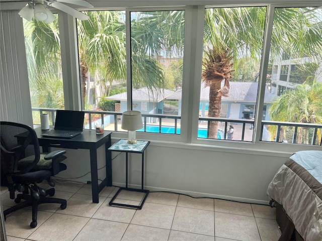 sunroom / solarium with ceiling fan