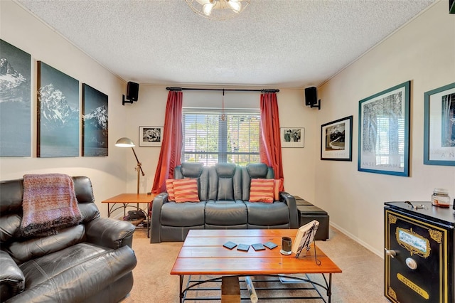 carpeted living room with baseboards and a textured ceiling