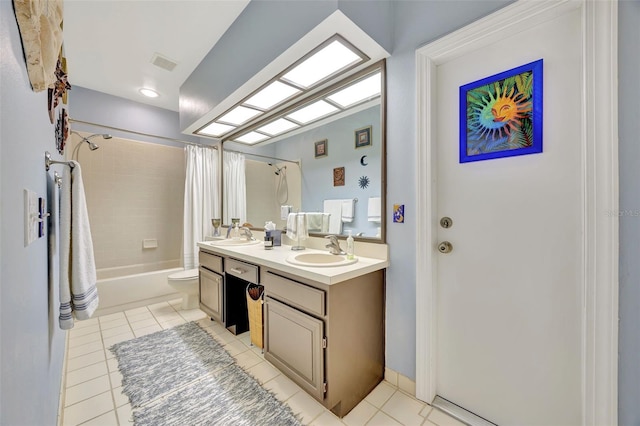 full bathroom featuring vanity, toilet, tile patterned floors, and shower / bathtub combination with curtain