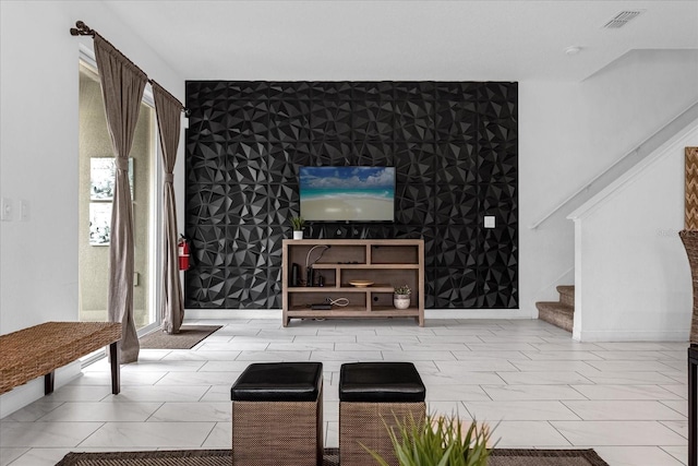 living room with light tile patterned floors