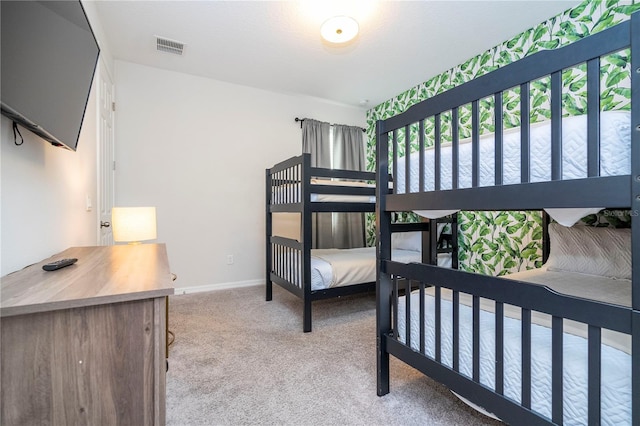 bedroom featuring carpet