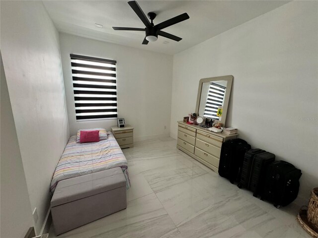 bedroom featuring ceiling fan