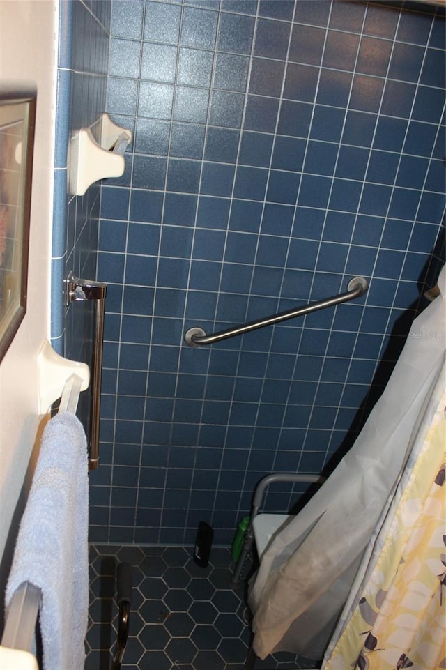 bathroom with a shower with curtain