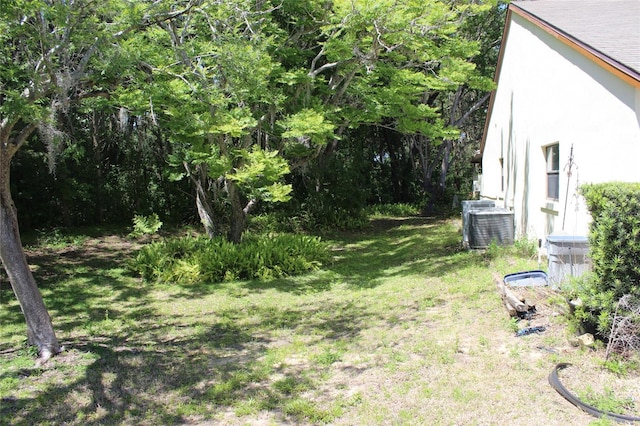 view of yard featuring central AC