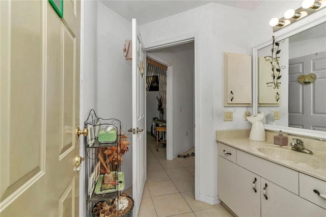 bathroom with vanity and tile patterned floors