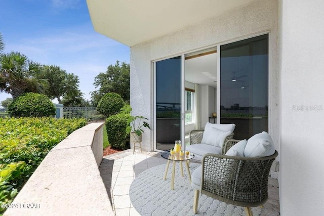 231 Riverside Dr Unit 101-1, Holly Hill, FL 32117 - view of patio / terrace featuring fence