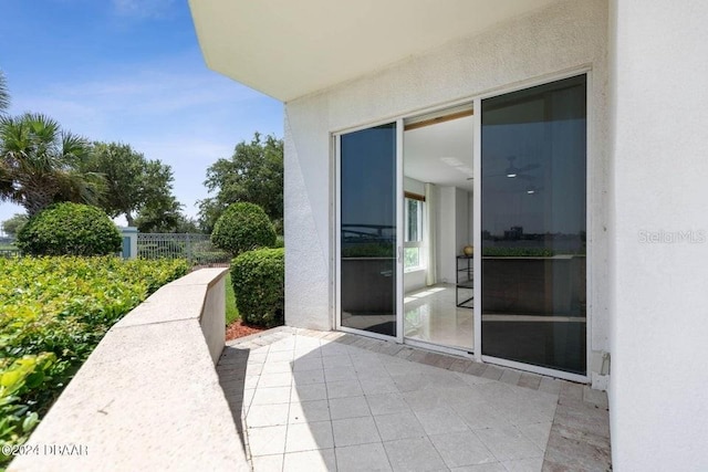 231 Riverside Dr Unit 101-1, Holly Hill, FL 32117 - view of patio featuring fence