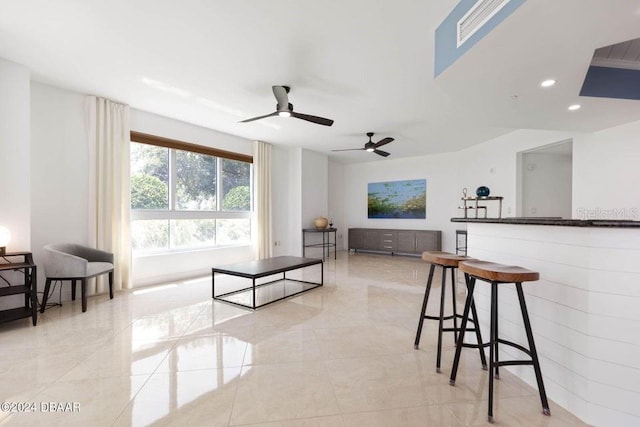 231 Riverside Dr Unit 101-1, Holly Hill, FL 32117 - living area with ceiling fan, recessed lighting, and light tile patterned flooring