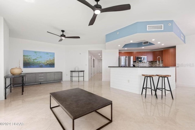 231 Riverside Dr Unit 101-1, Holly Hill, FL 32117 - living area with ceiling fan, light tile patterned floors, and recessed lighting