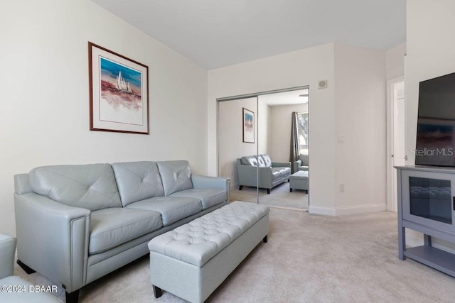 231 Riverside Dr Unit 101-1, Holly Hill, FL 32117 - living area with light colored carpet and baseboards